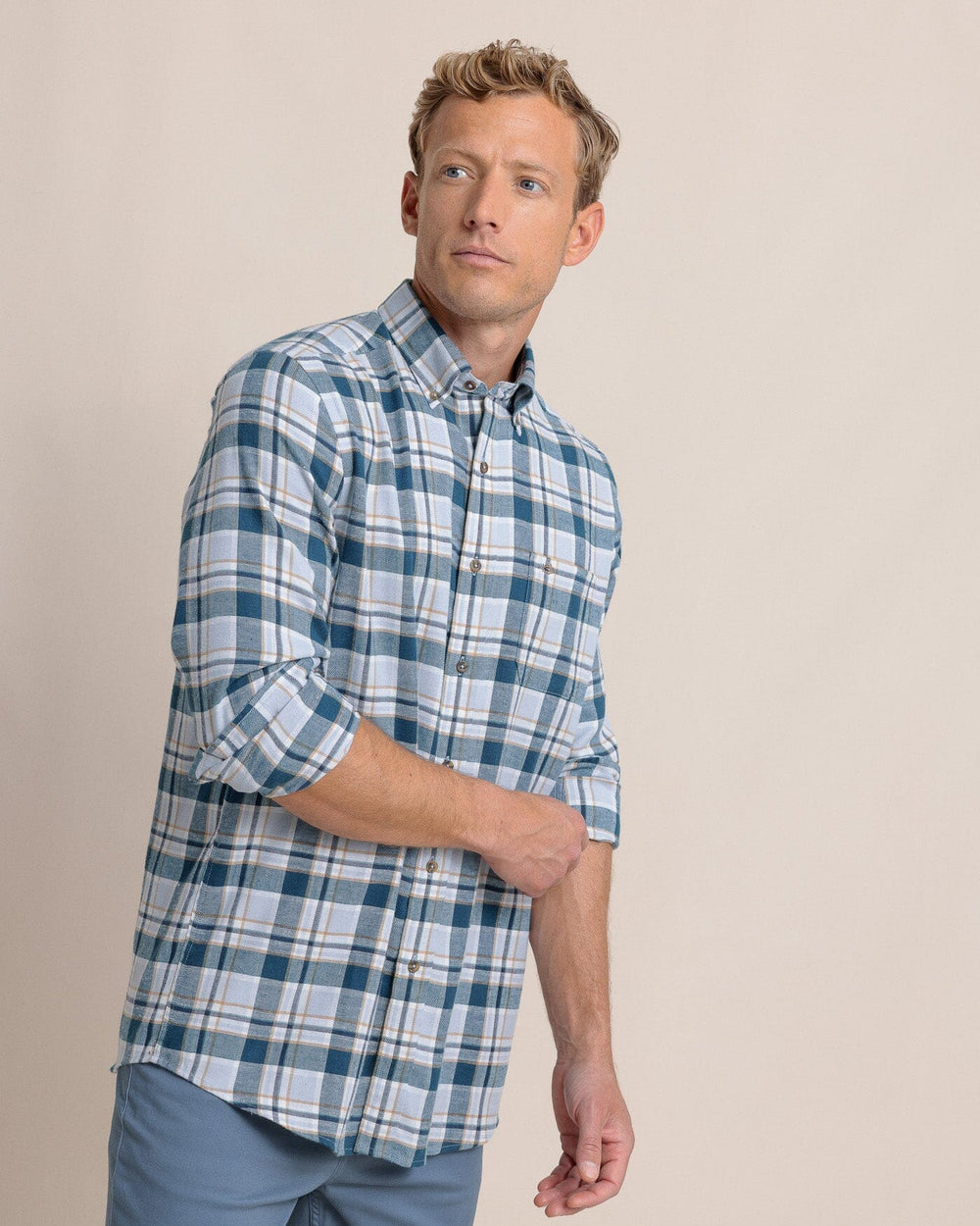 The side view of the Southern Tide Sweetgrass Plaid Beach Flannel Long Sleeve Sport Shirt by Southern Tide - Teal Haze