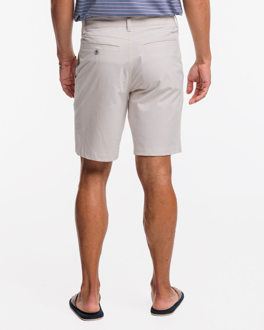 The back view of the Southern Tide T3 Gulf 9 Inch Performance Short by Southern Tide - Stone