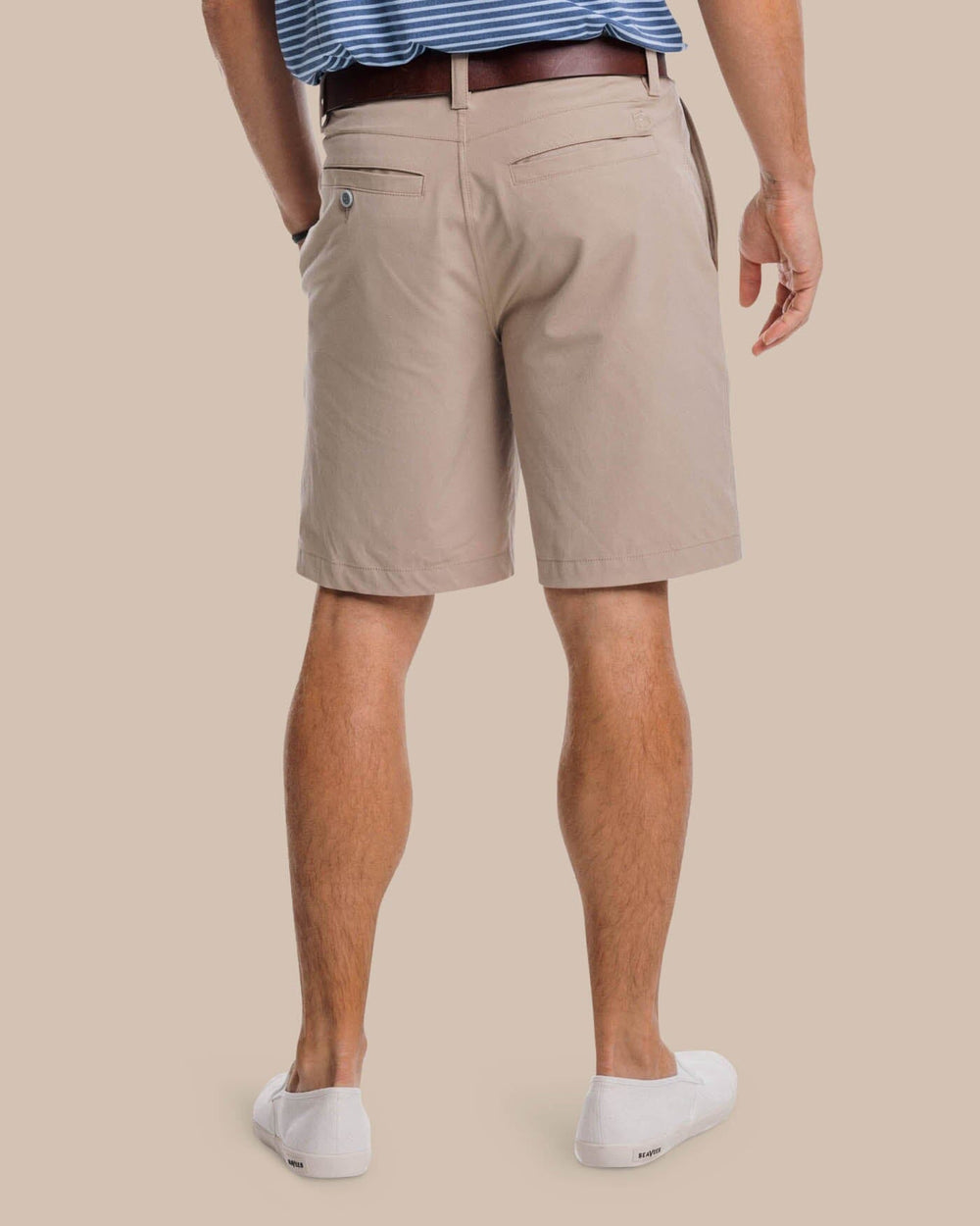 The back view of the Southern Tide T3 Gulf 9 Inch Performance Short by Southern Tide - Sandstone Khaki