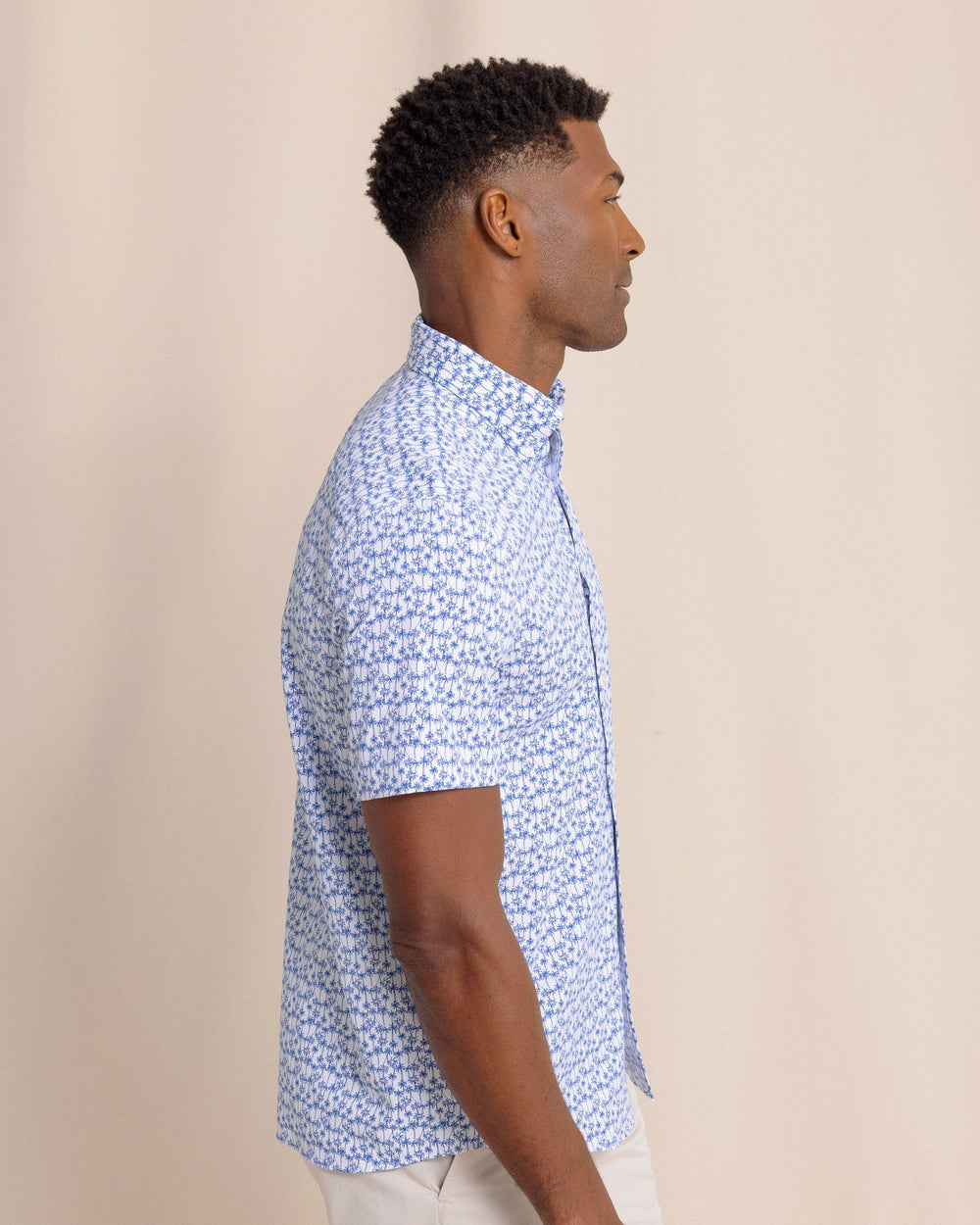 The side view of the Southern Tide Talk To The Palm Intercoastal Short Sleeve Sport Shirt by Southern Tide - Classic White