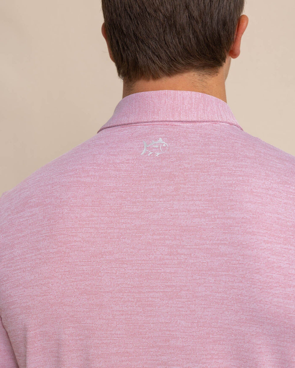 The detail view of the Southern Tide Team Colors Driver Spacedye Polo Shirt by Southern Tide - Crimson