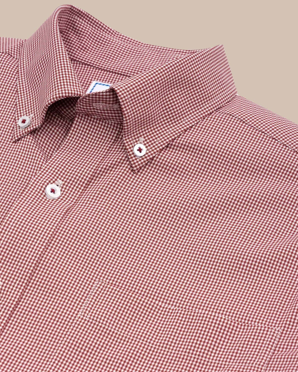The detail view of the Southern Tide Team Colors Gingham Intercoastal Sport Shirt by Southern Tide - Crimson