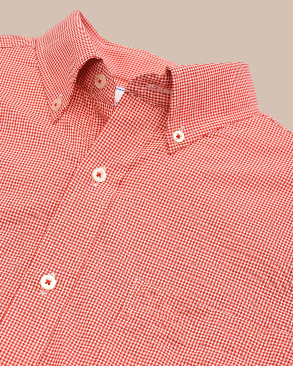 The detail view of the Southern Tide Team Colors Gingham Intercoastal Sport Shirt by Southern Tide - Endzone Orange