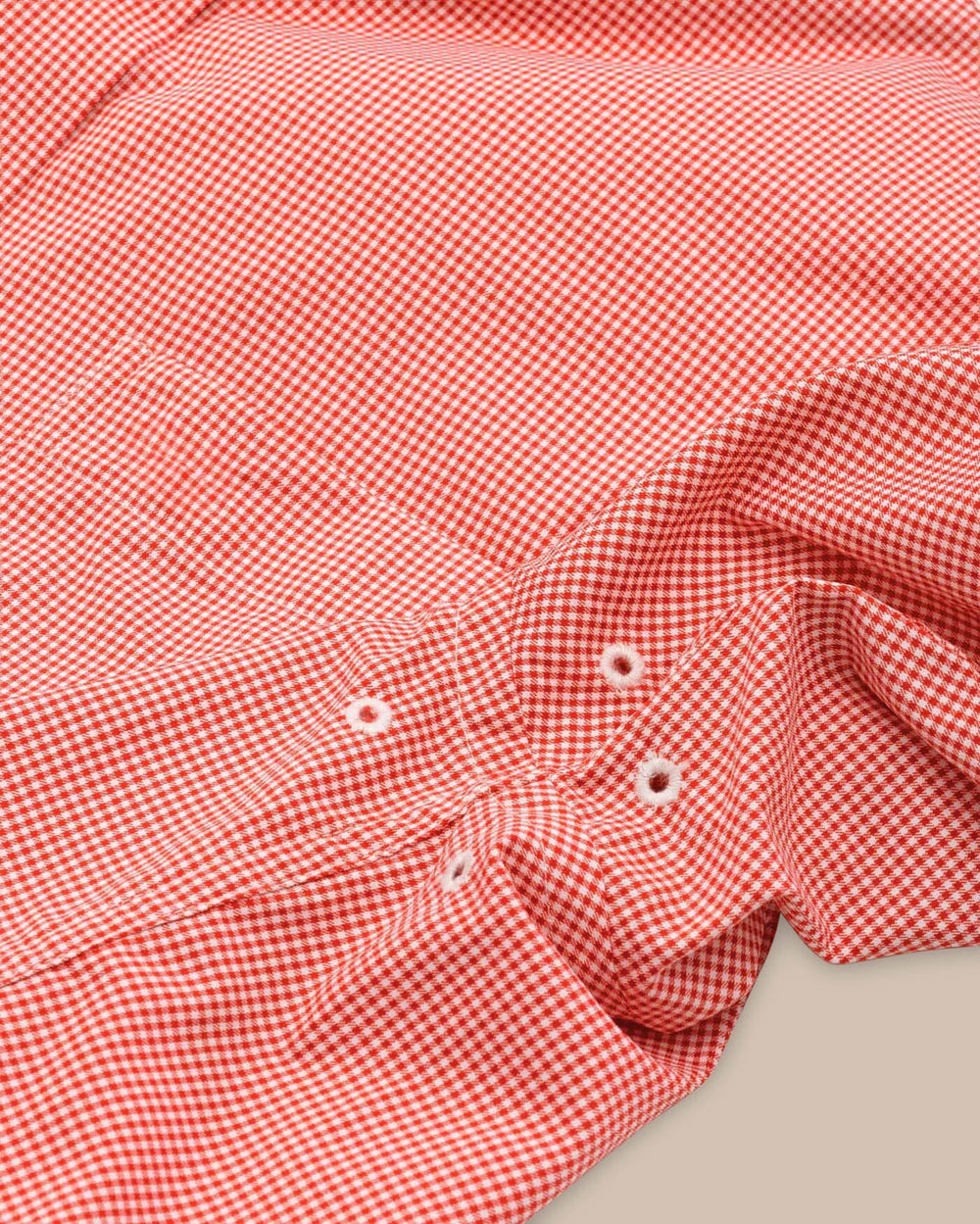 The detail view of the Southern Tide Team Colors Gingham Intercoastal Sport Shirt by Southern Tide - Endzone Orange