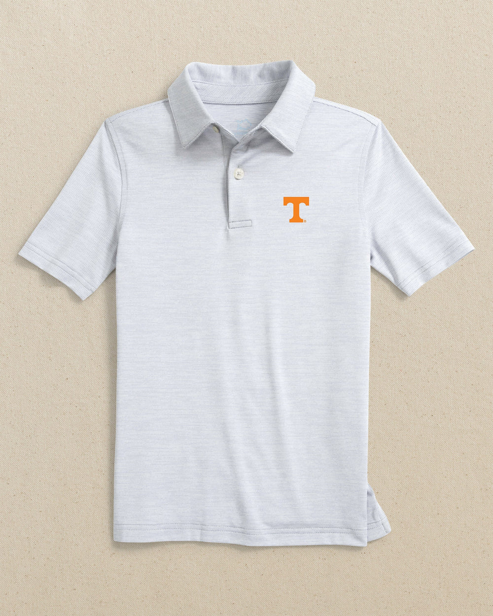 The front view of the Southern Tide Tennessee Vols Boys Driver Spacedye Polo Shirt by Southern Tide - Slate Grey