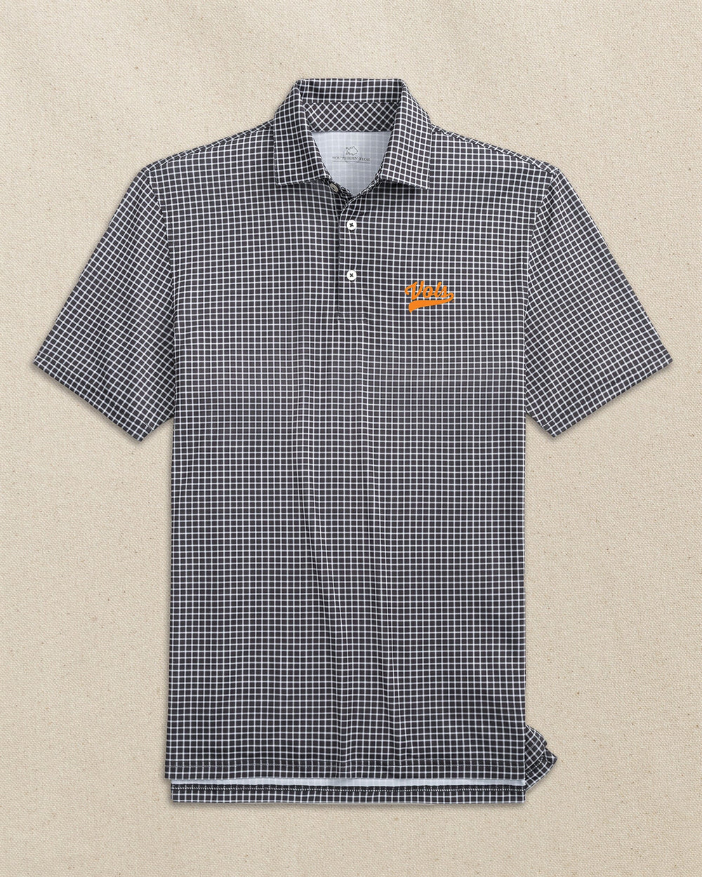 The front view of the Southern Tide Tennessee Vols Script Driver Dunes Edge Plaid Polo by Southern Tide - Black