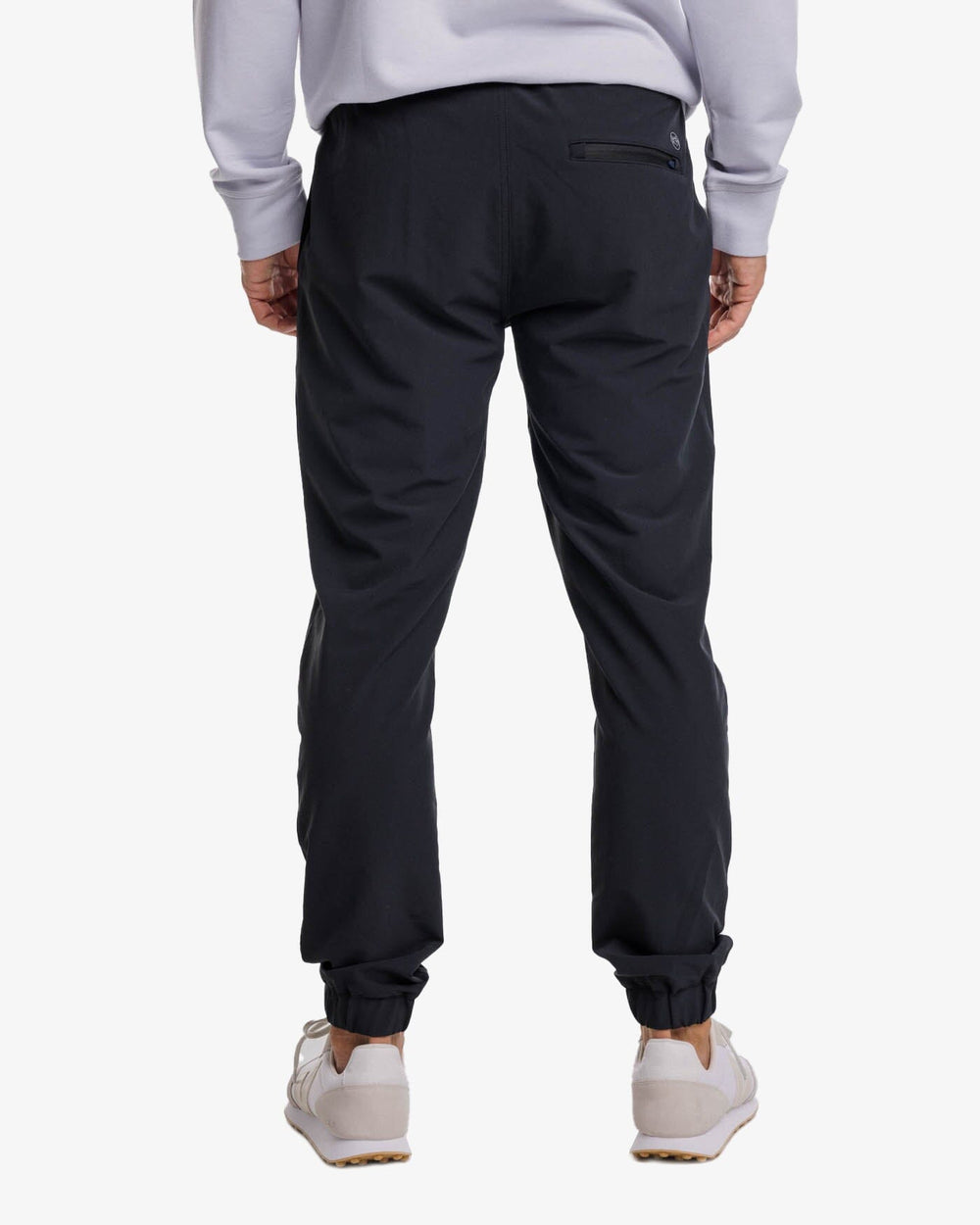 The back view of the Southern Tide The Excursion Performance Jogger by Southern Tide - Caviar Black