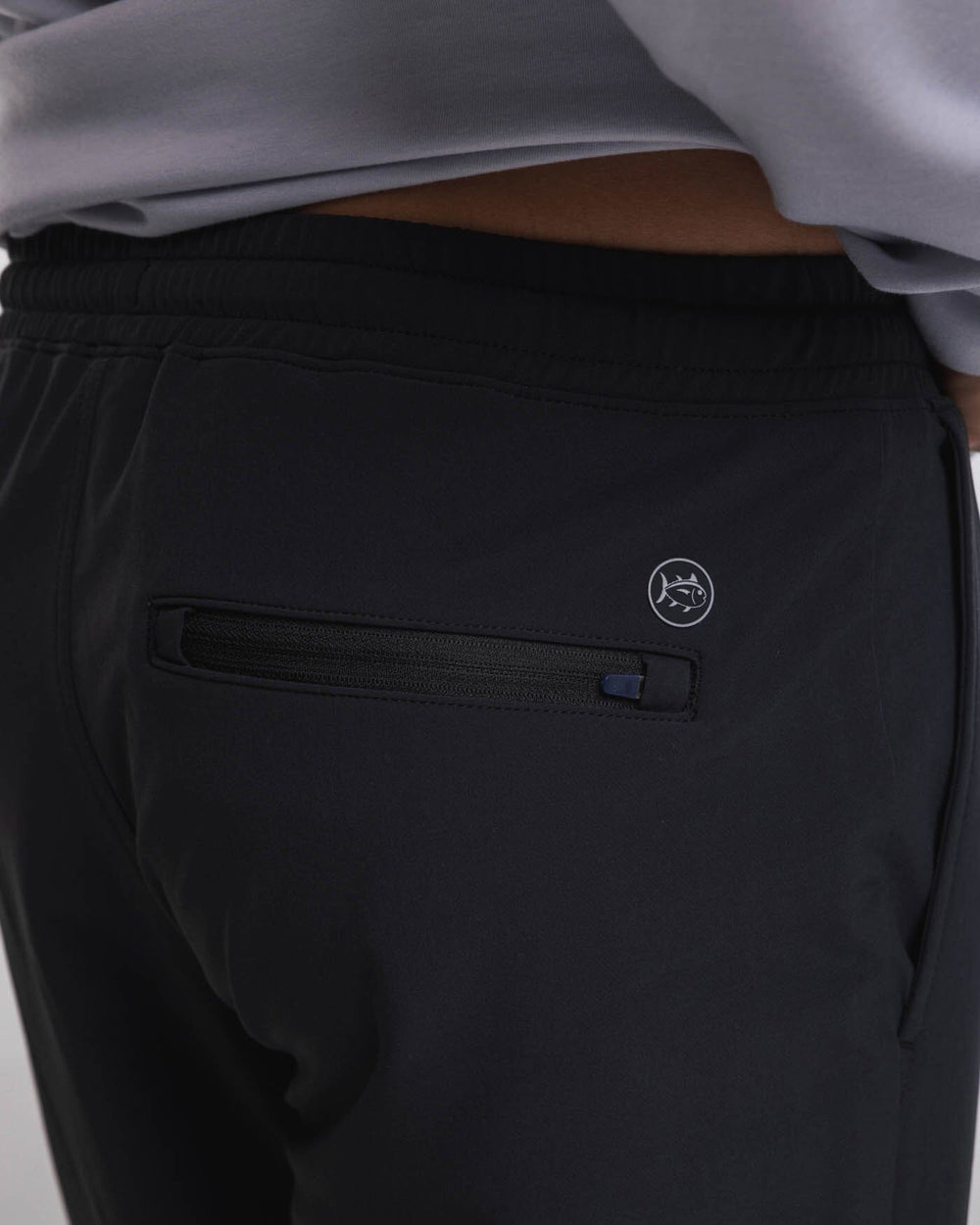 The detail view of the Southern Tide The Excursion Performance Jogger by Southern Tide - Caviar Black