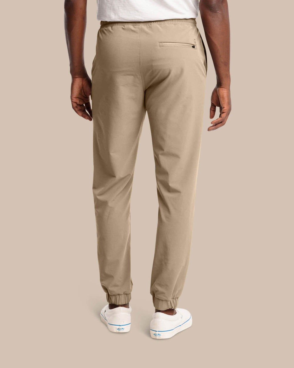 The back view of the Southern Tide The Excursion Performance Jogger by Southern Tide - Sandstone Khaki