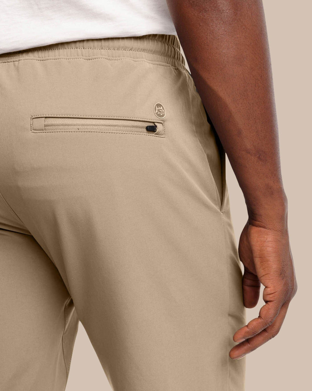 The detail view of the Southern Tide The Excursion Performance Jogger by Southern Tide - Sandstone Khaki