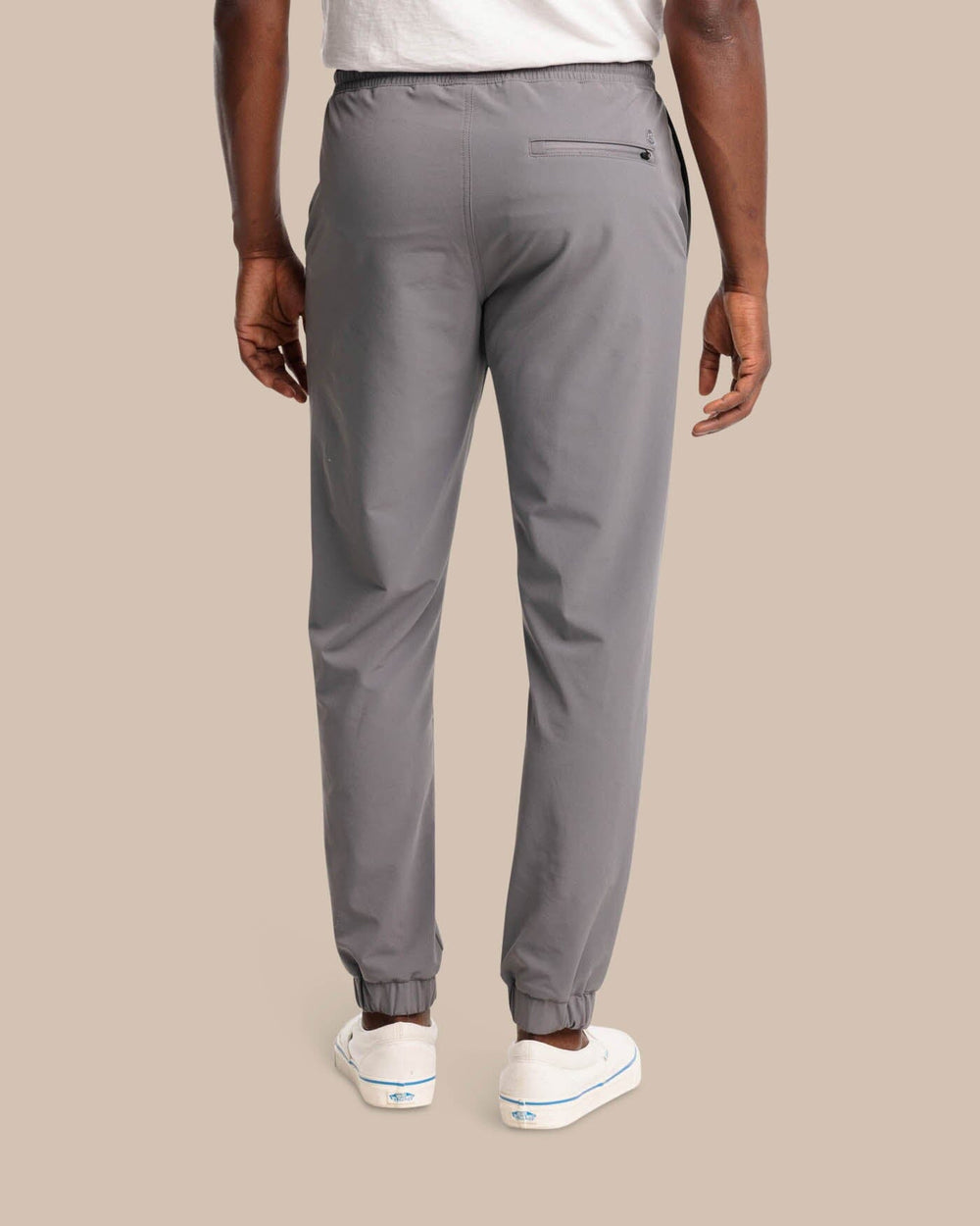 The back view of the The Excursion Performance Jogger by Southern Tide - Smoked Pearl