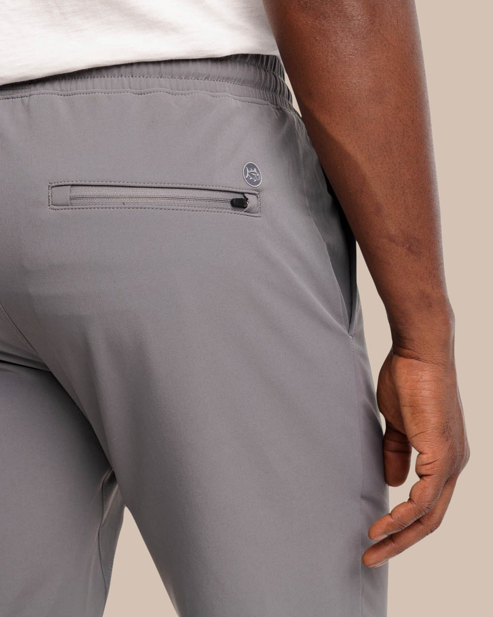 The detail view of the The Excursion Performance Jogger by Southern Tide - Smoked Pearl