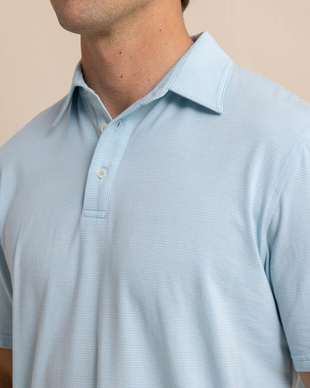 The detail view of the Southern Tide The Seaport Davenport Stripe Polo by Southern Tide - Clearwater Blue