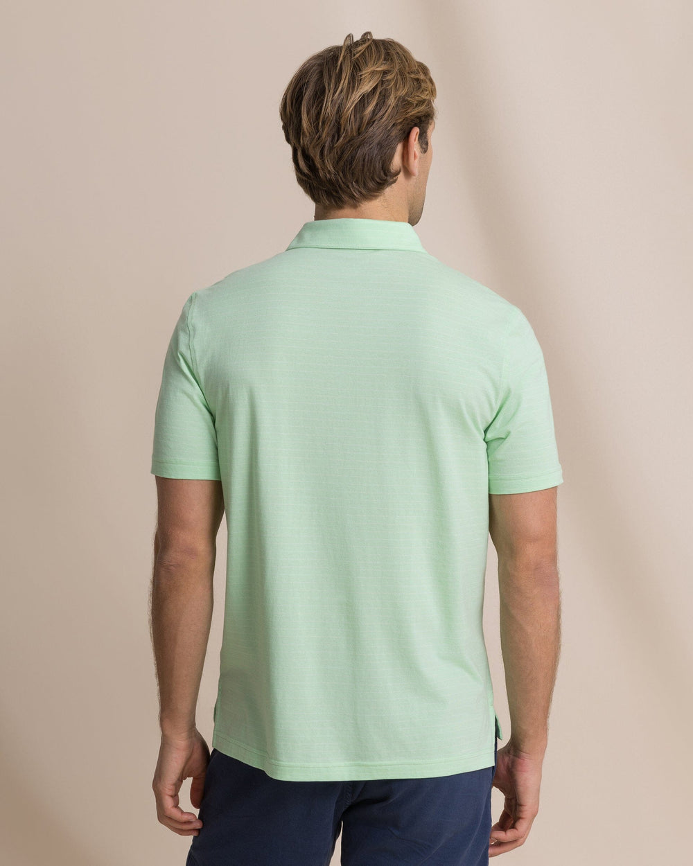 The back view of the Southern Tide The Seaport Kinston Stripe Polo by Southern Tide - Green Ash