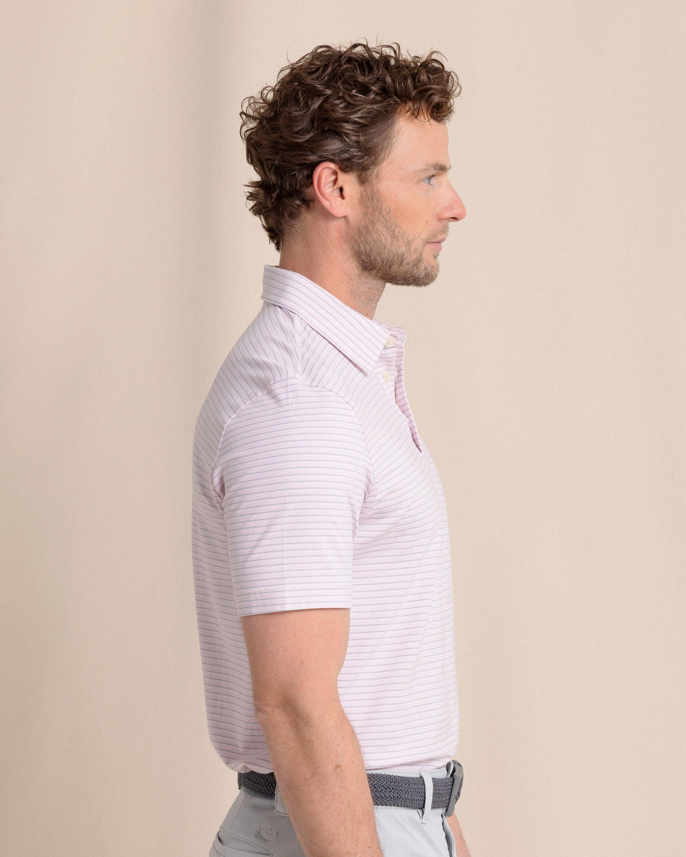 The side view of the Southern Tide The Seaport Kinston Stripe Polo by Southern Tide - Parfait Pink