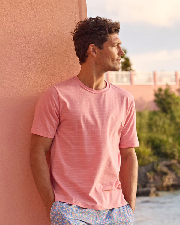 The lifestyle view of the Southern Tide The Seaport Kinston Stripe T-Shirt by Southern Tide - Petal Pink