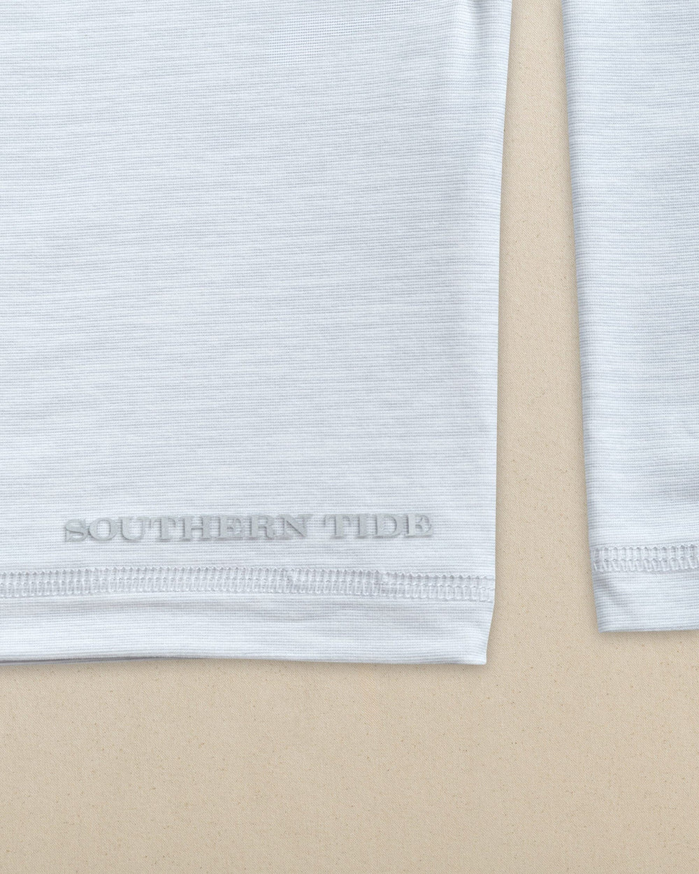 The detail view of the Southern Tide Troller Boat Coastal Breeze® Performance Hoodie by Southern Tide - Platinum Grey