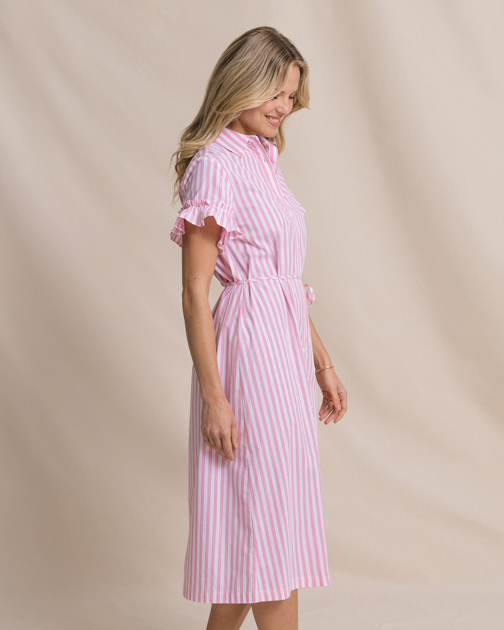The side view of the Southern Tide Tyra Striped Ruffle Sleeve Midi Dress by Southern Tide - Sea Pink