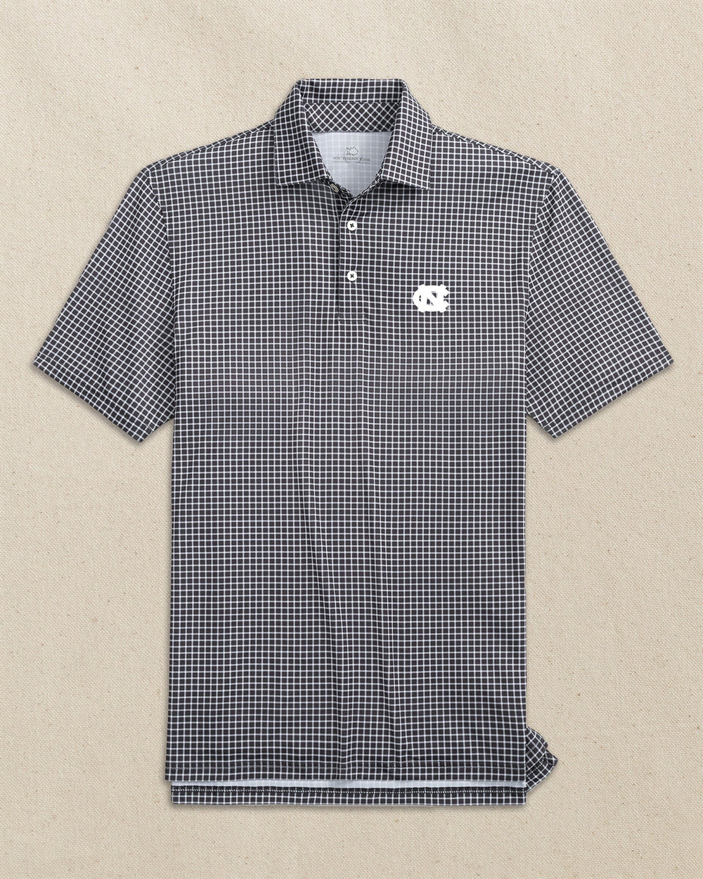 The front view of the Southern Tide UNC Tar Heels Driver Dunes Edge Plaid Polo by Southern Tide - Black