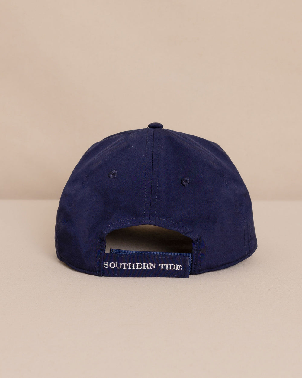 The back view of the Southern Tide USA Flag Skipjack Performance Hat by Southern Tide - Yacht Blue