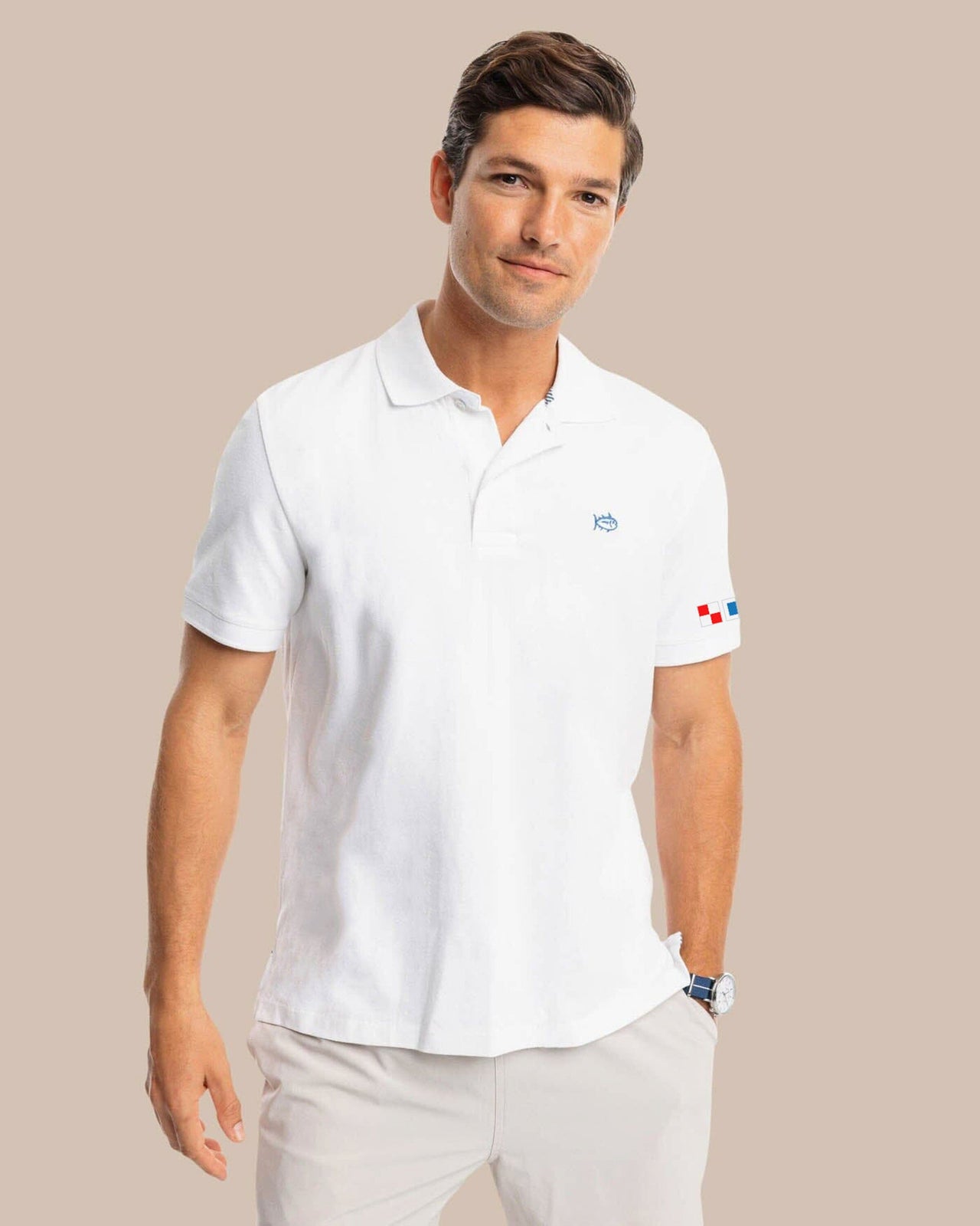 The front view of the Southern Tide USA Nautical Flags Skipjack Polo by Southern Tide - Classic White
