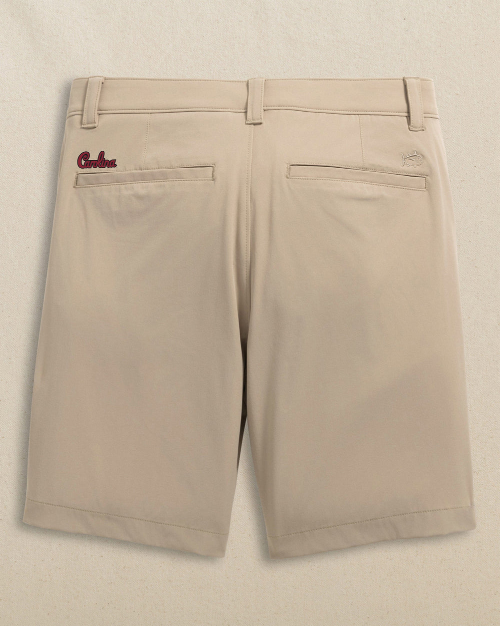 The back view of the Southern Tide USC Gamecocks Script Birdie 8" Coastal Breeze® Performance Short by Southern Tide - Sandstone Khaki
