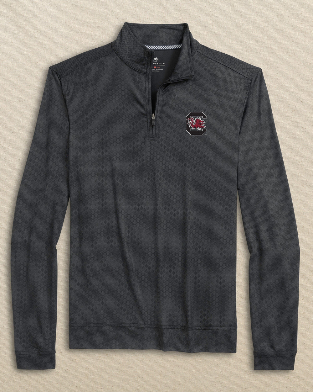 The front view of the Southern Tide USC Gamecocks Cruiser ST Geo Printed Quarter Zip by Southern Tide - Caviar Black