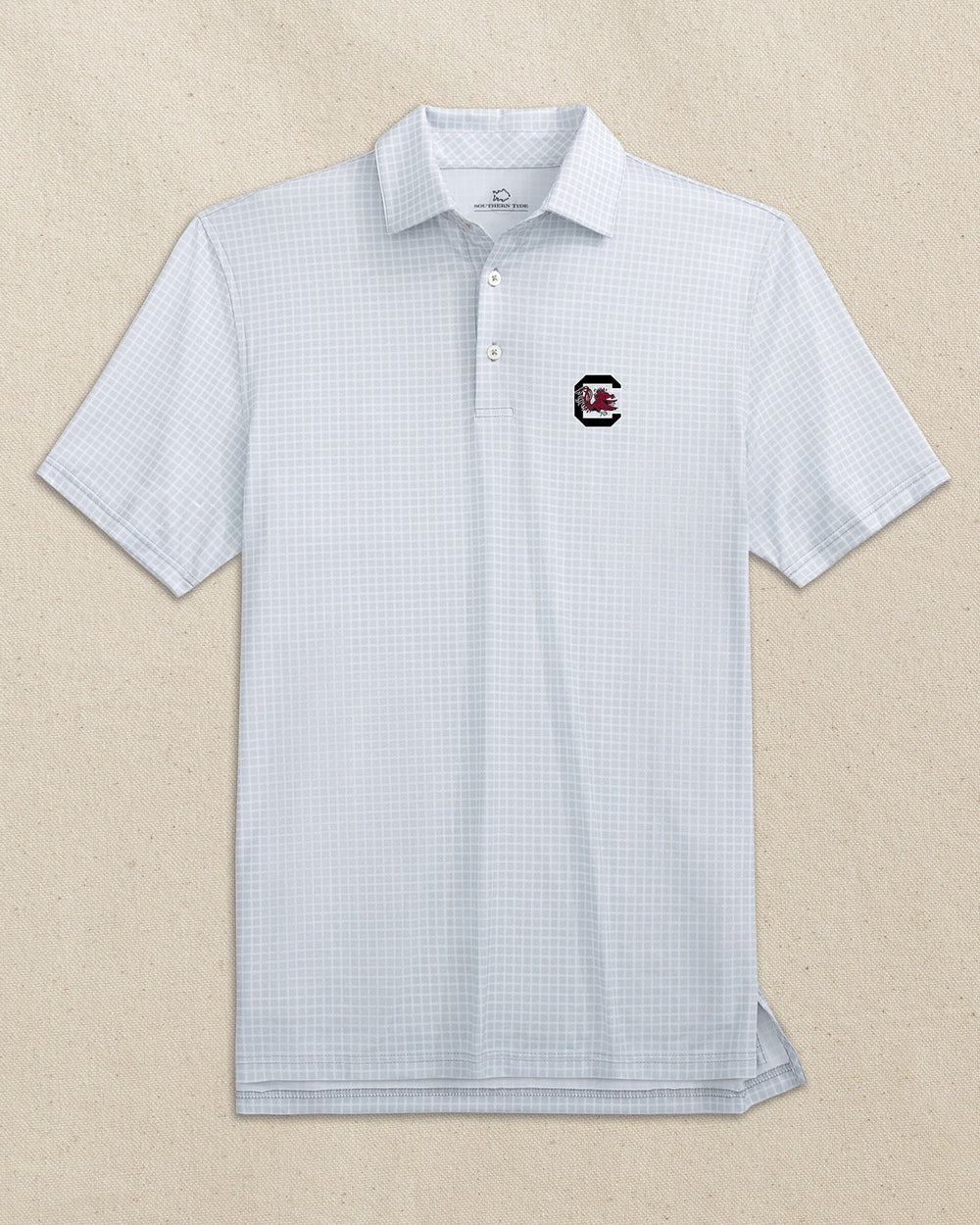The front view of the Southern Tide USC Gamecocks Driver Dunes Edge Plaid Polo by Southern Tide - Slate Grey