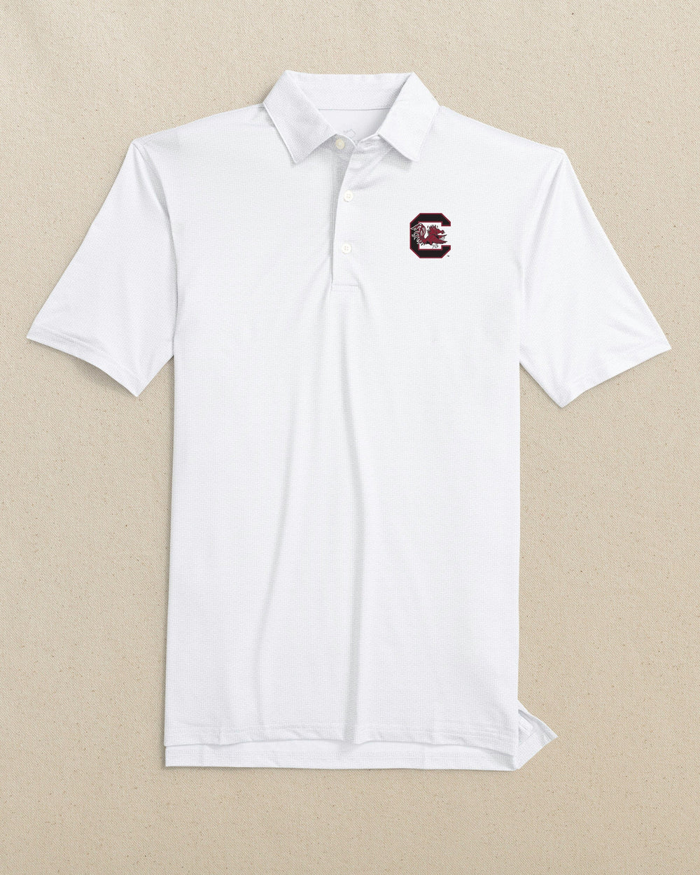 The front view of the Southern Tide USC Gamecocks Driver ST Geo Printed Polo by Southern Tide - Classic White