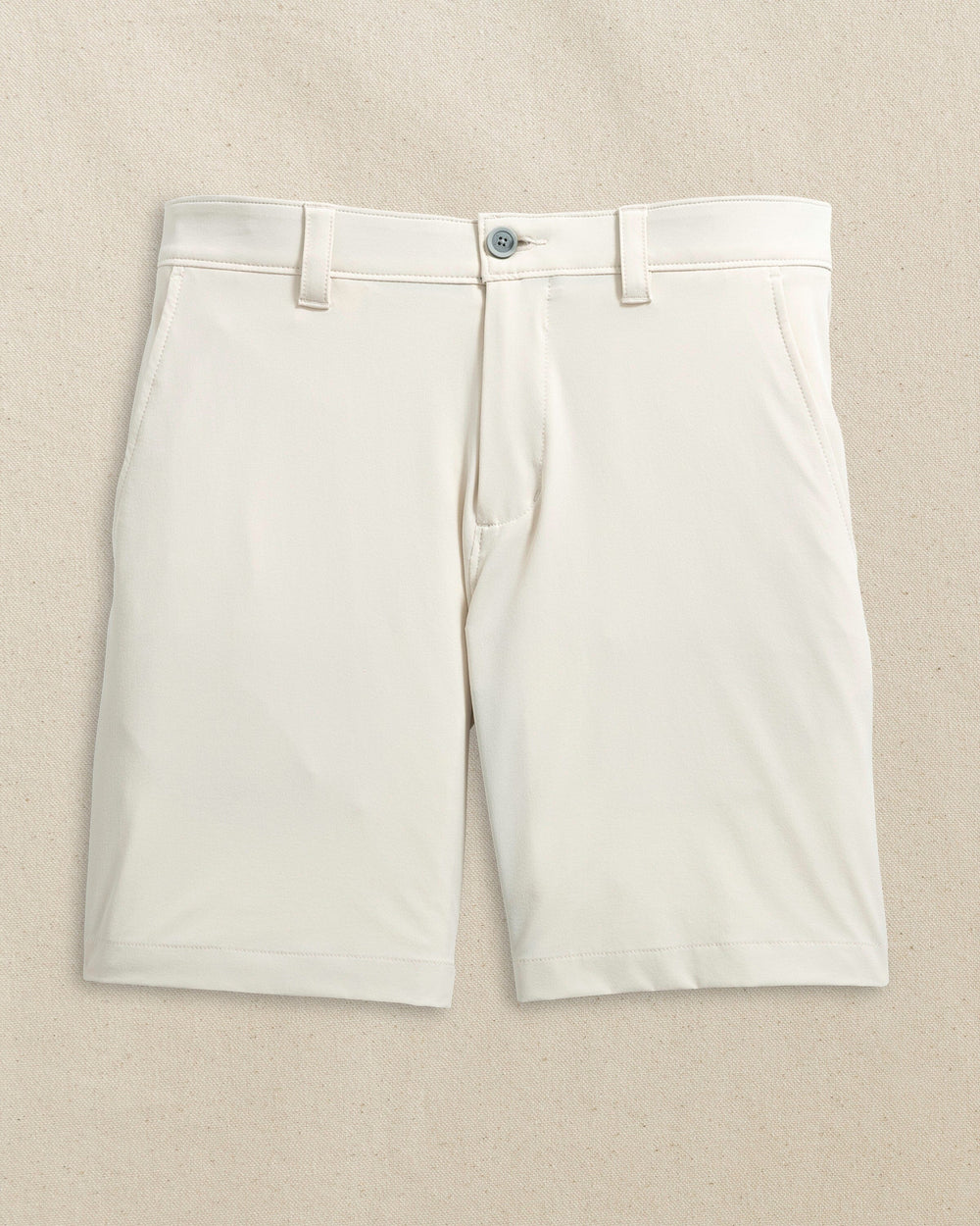 The front view of the Southern Tide UVA Cavaliers brrr°®-die 8" Performance Short by Southern Tide - Stone