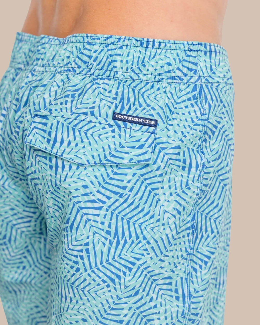 The detail view of the Southern Tide Vibin' Palm Printed Swim Short by Southern Tide - Atlantic Blue
