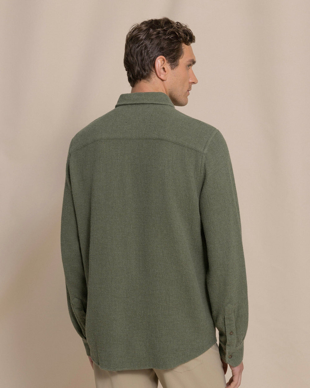 The back view of the Southern Tide Waffle Weave Heather Sport Shirt by Southern Tide - Heather Cedar Green