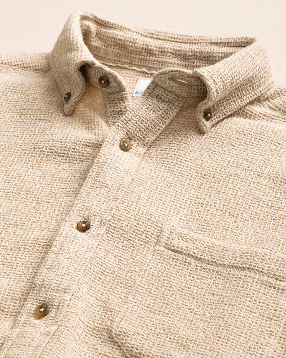 The detail view of the Southern Tide Waffle Weave Heather Sport Shirt by Southern Tide - Heather Sand Dunes