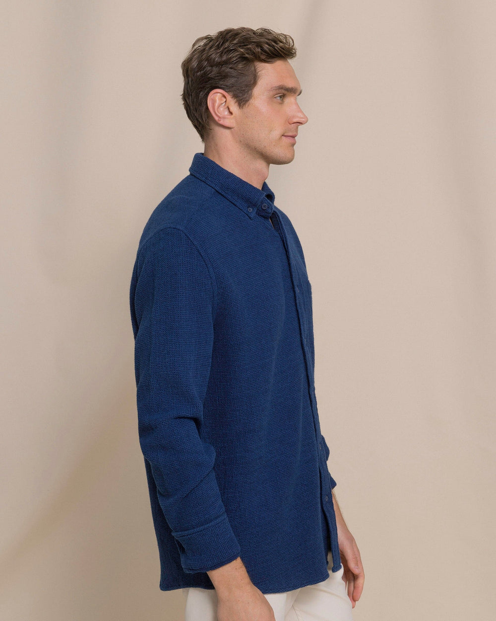 The side view of the Southern Tide Waffle Weave Sport Shirt by Southern Tide - Dark Blue