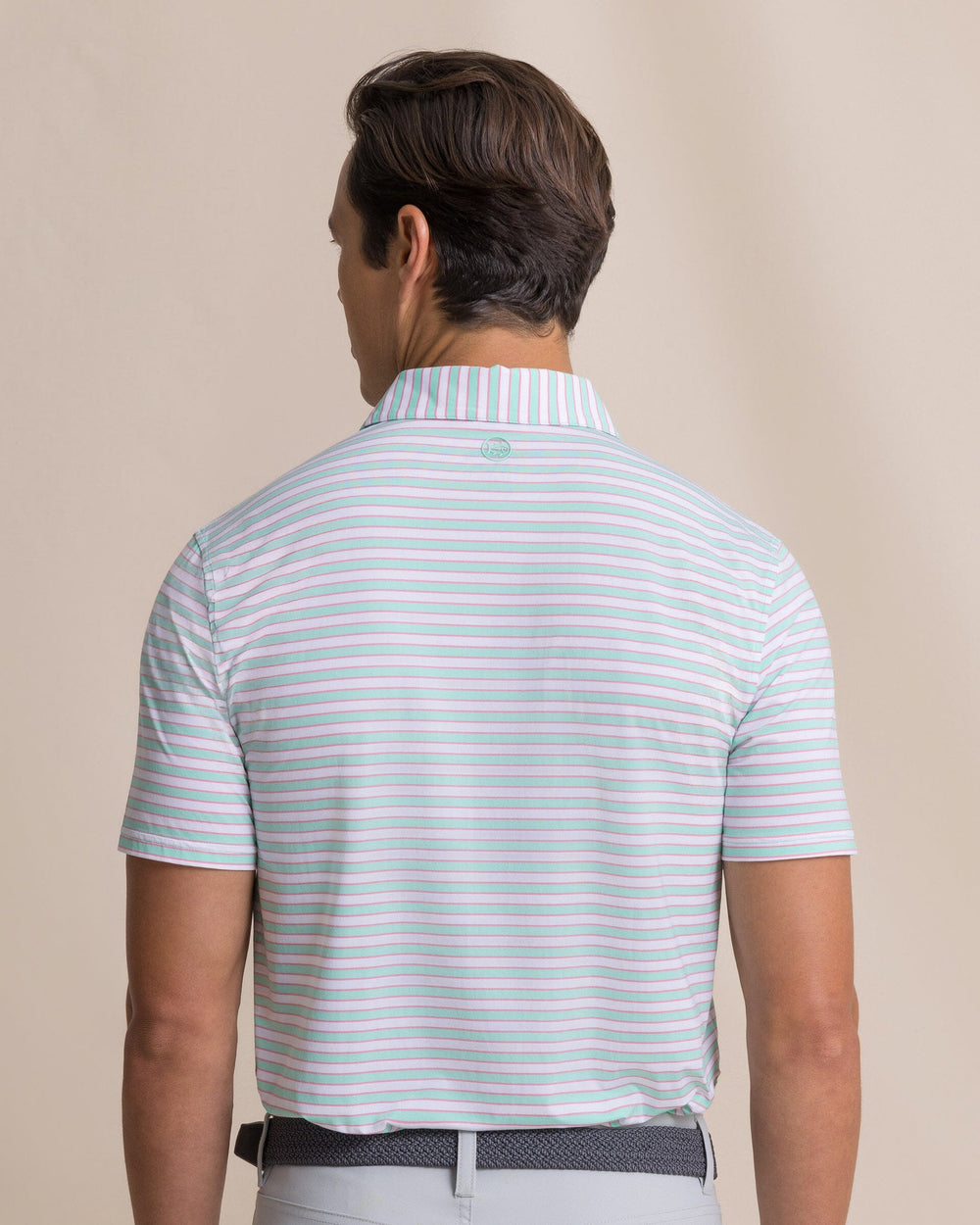 The back view of the Southern Tide Water Way Stripe Coastal Breeze® Performance Polo by Southern Tide - Gulf Shores
