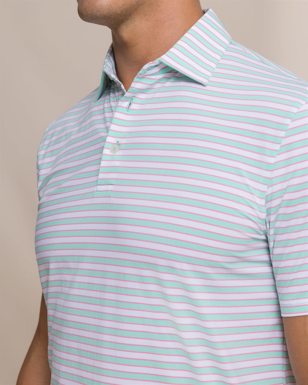 The detail view of the Southern Tide Water Way Stripe Coastal Breeze® Performance Polo by Southern Tide - Gulf Shores