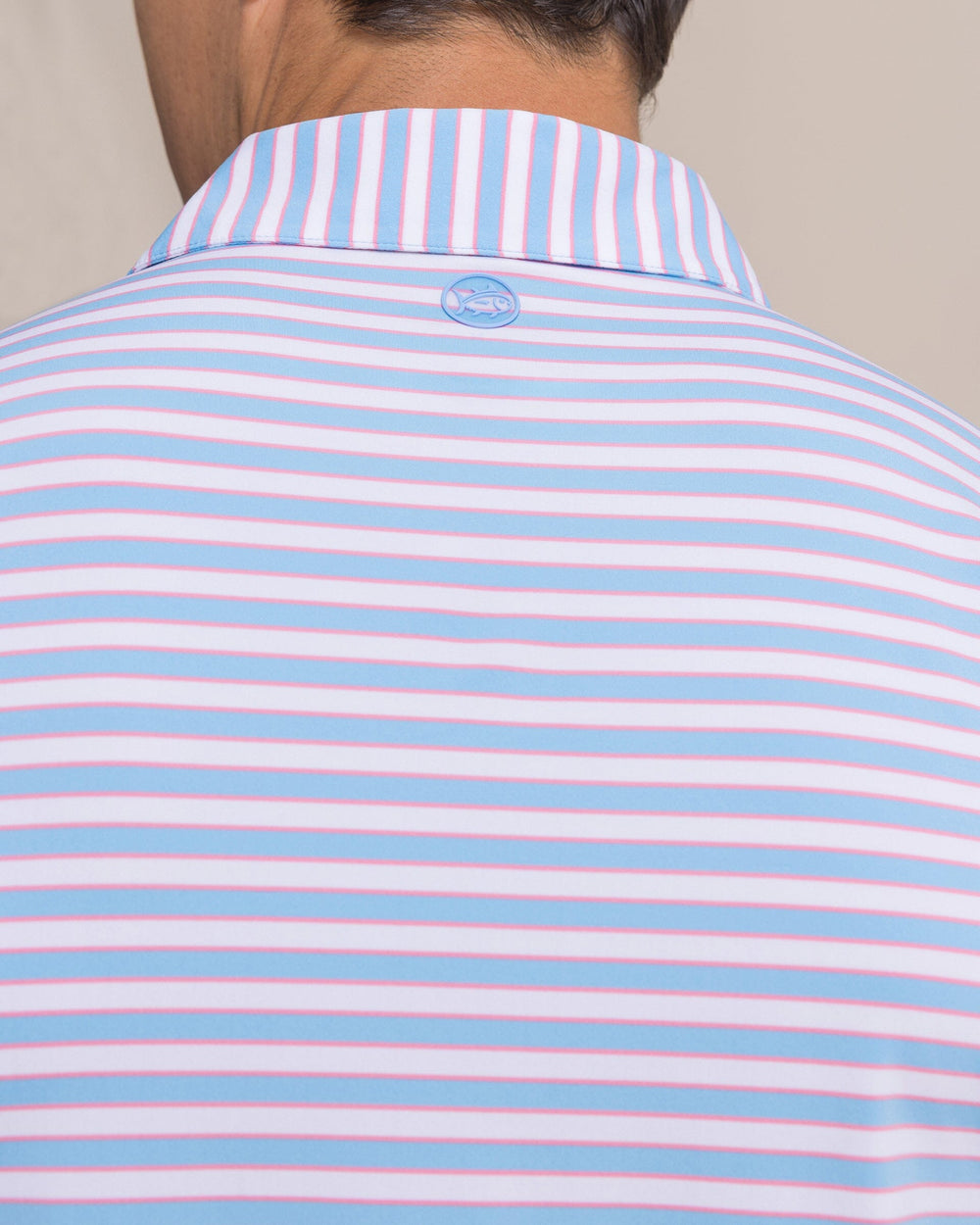 The detail view of the Southern Tide Water Way Stripe Coastal Breeze® Performance Polo by Southern Tide - Ocean Channel