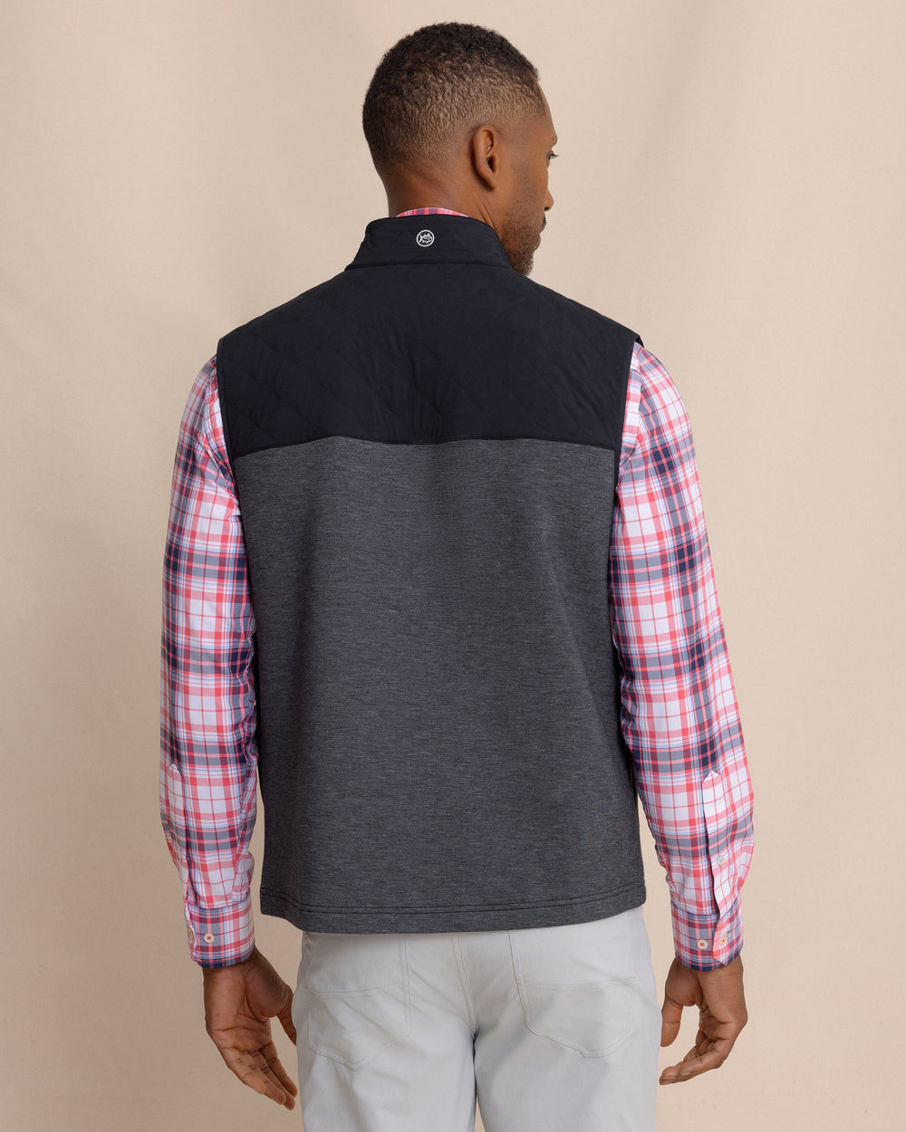 The back view of the Southern Tide Waterfront Quilted Vest by Southern Tide - Caviar Black