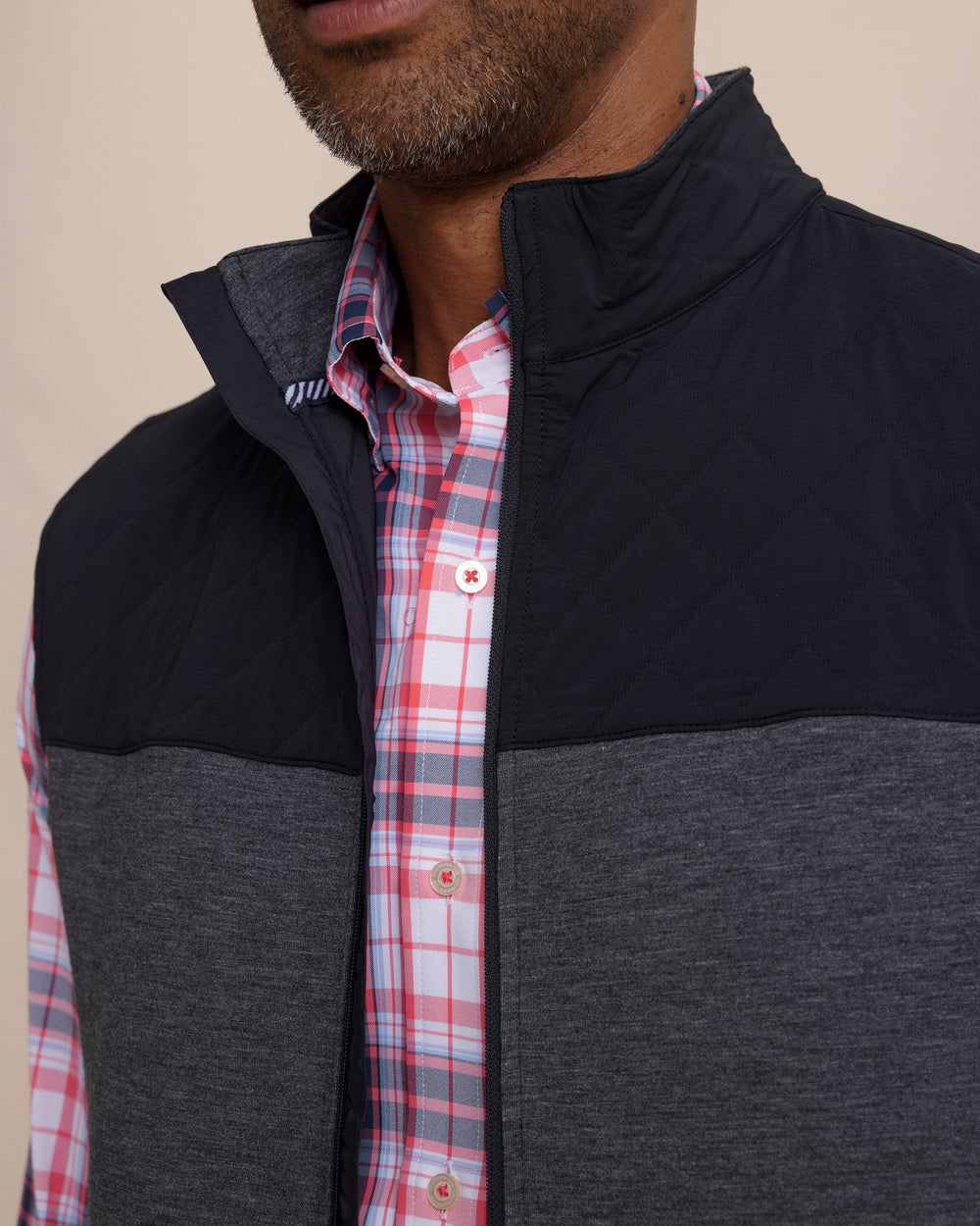 The detail view of the Southern Tide Waterfront Quilted Vest by Southern Tide - Caviar Black