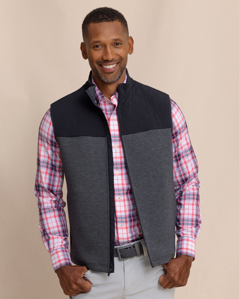The front view of the Southern Tide Waterfront Quilted Vest by Southern Tide - Caviar Black