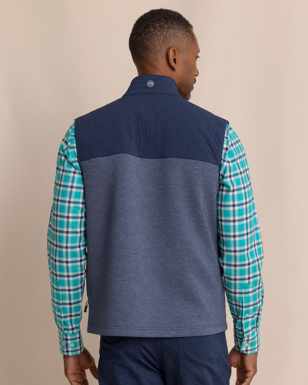 The back view of the Southern Tide Waterfront Quilted Vest by Southern Tide - Dress Blue