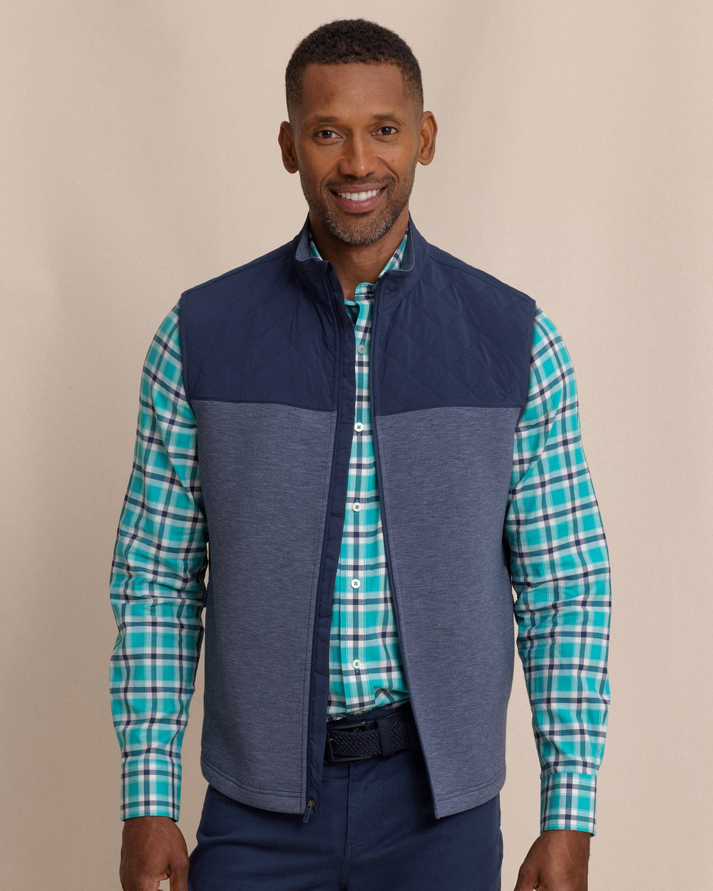 The front view of the Southern Tide Waterfront Quilted Vest by Southern Tide - Dress Blue
