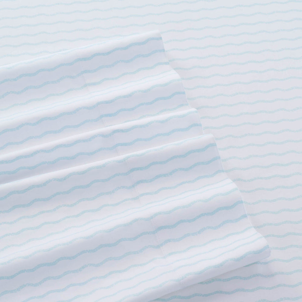The detail view of the Southern Tide Wavy Stripe Standard Aqua Pillowcase Pair by Southern Tide - Aqua