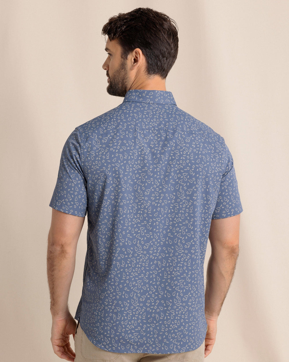 The back view of the Southern Tide Whiskey Hour Intercoastal Short Sleeve Sport Shirt by Southern Tide - Light Indigo