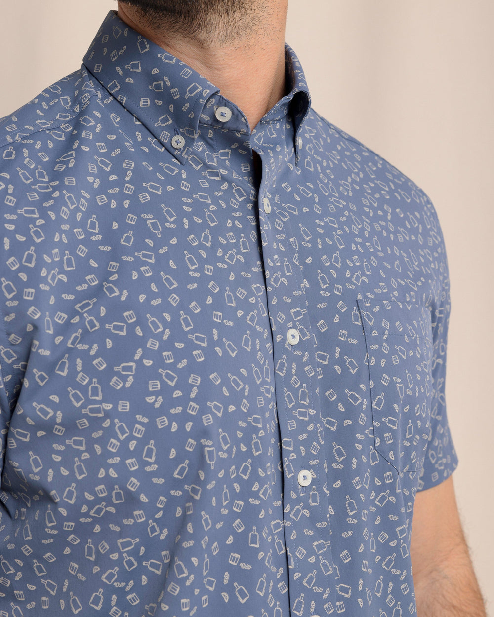 The front detail view of the Southern Tide Whiskey Hour Intercoastal Short Sleeve Sport Shirt by Southern Tide - Light Indigo