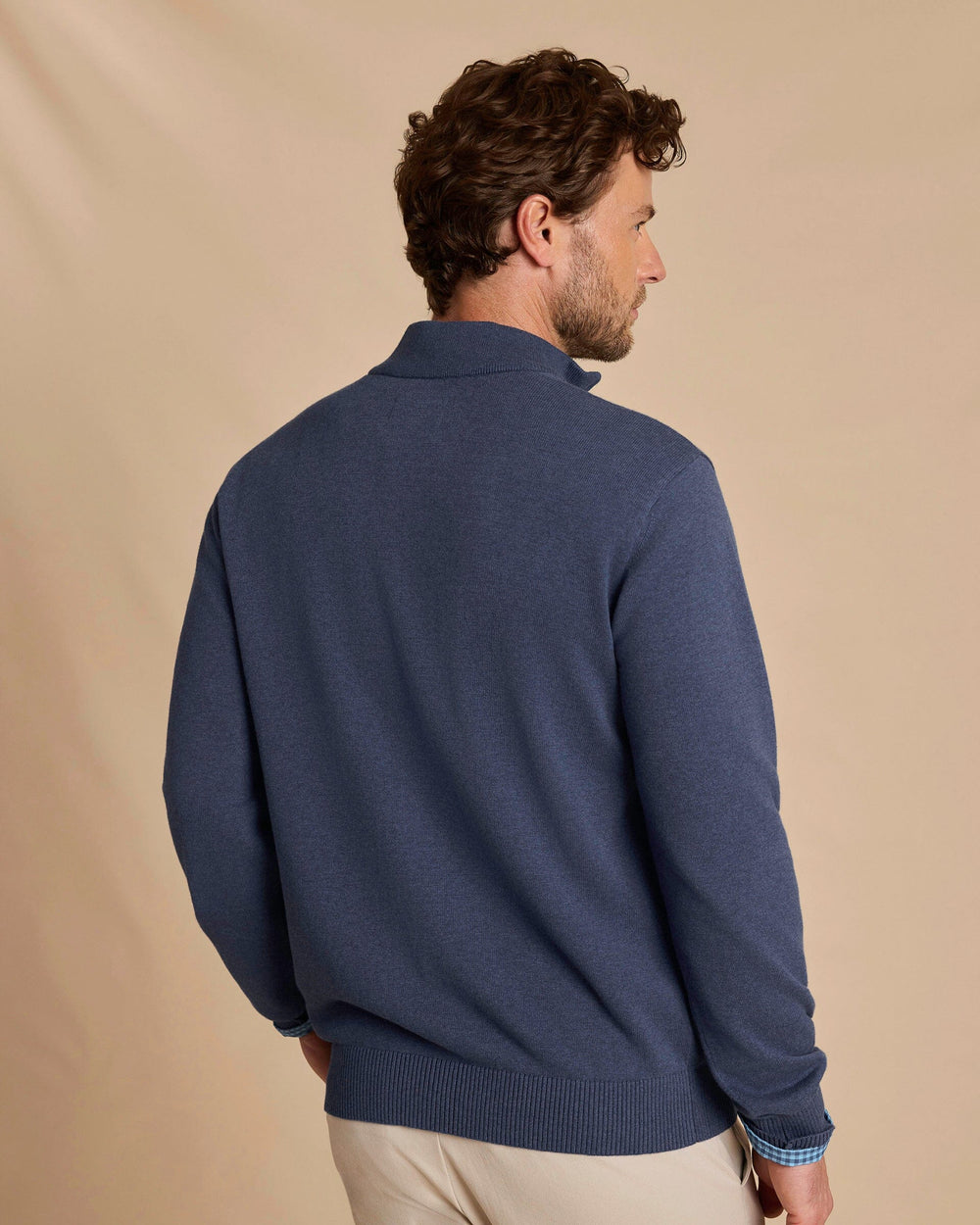 The back view of the Southern Tide Whitehaven Heather Quarter Zip Sweater by Southern Tide - Heather Nautical Blue