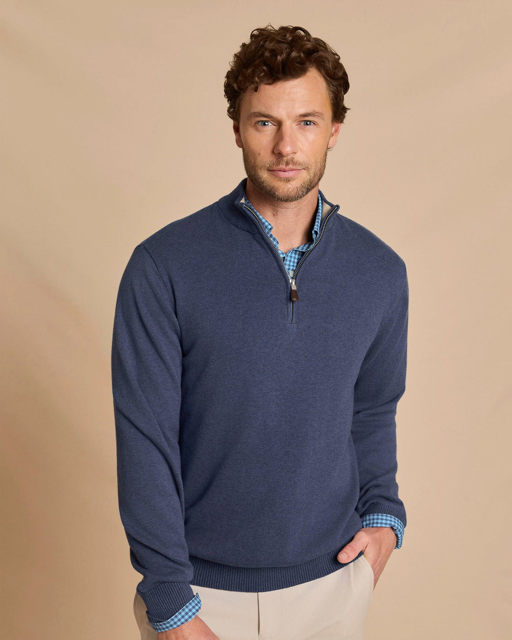 The front view of the Southern Tide Whitehaven Heather Quarter Zip Sweater by Southern Tide - Heather Nautical Blue