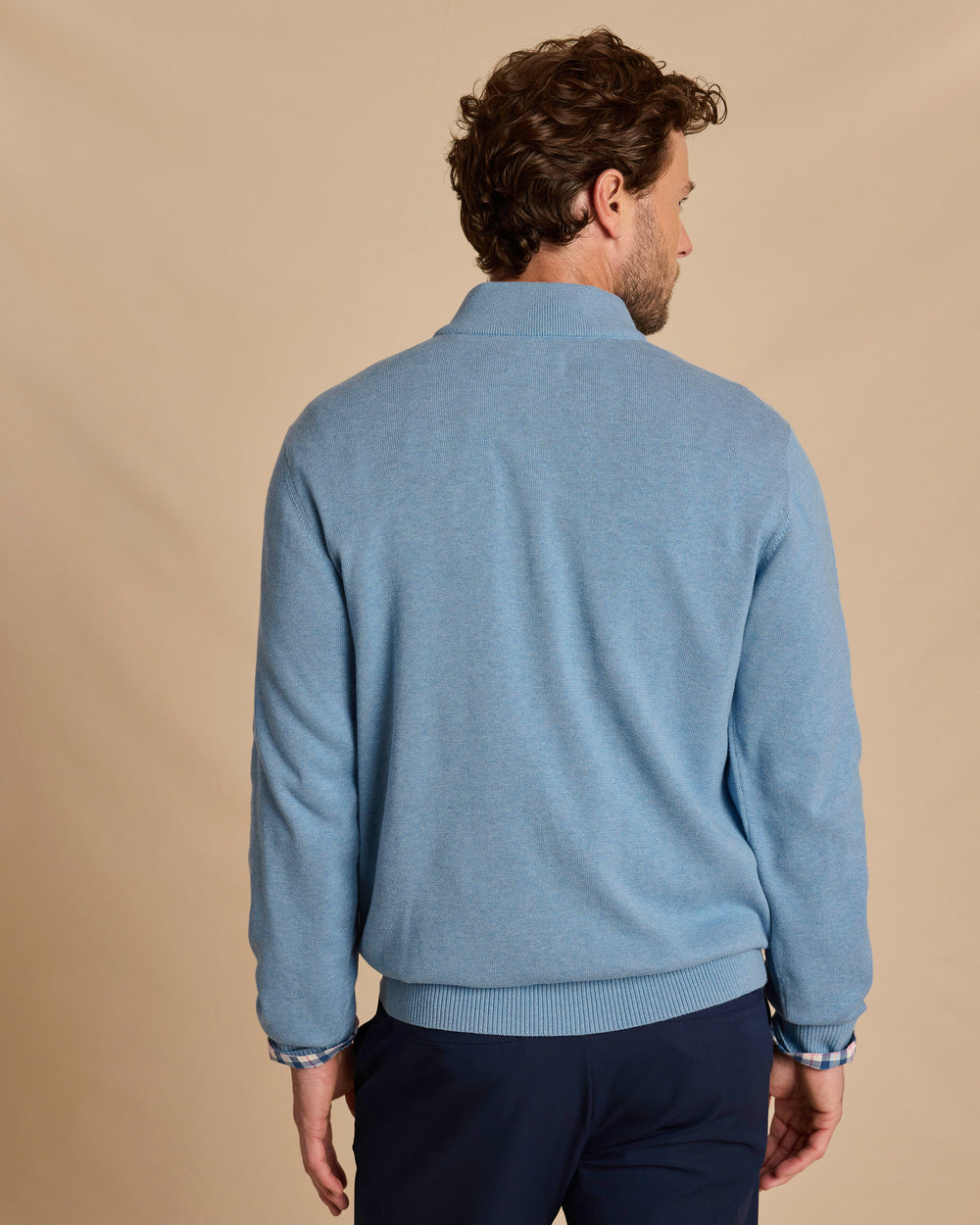 The back view of the Southern Tide Whitehaven Heather Quarter Zip Sweater by Southern Tide - Heather Ocean Channel