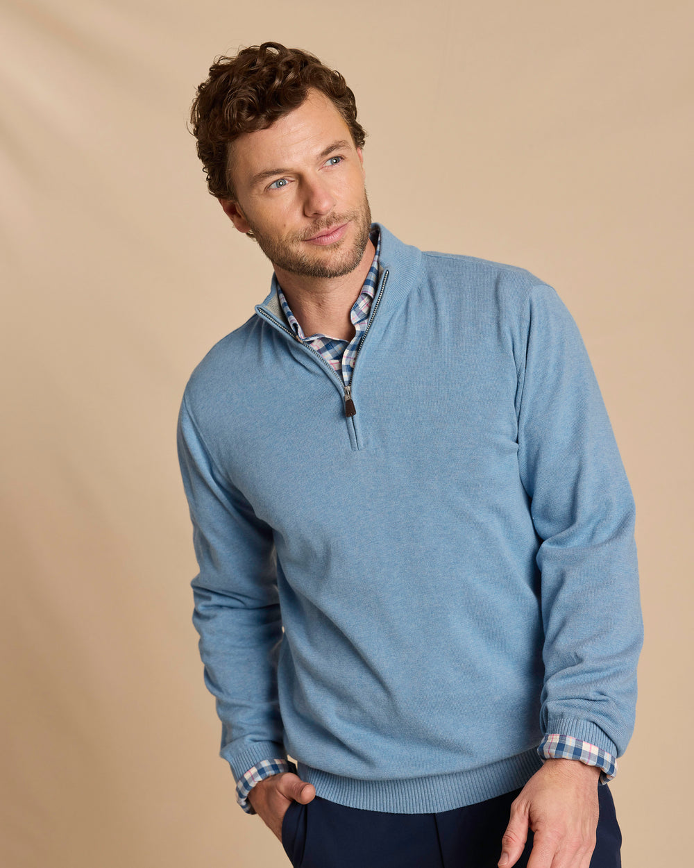 The front view of the Southern Tide Whitehaven Heather Quarter Zip Sweater by Southern Tide - Heather Ocean Channel