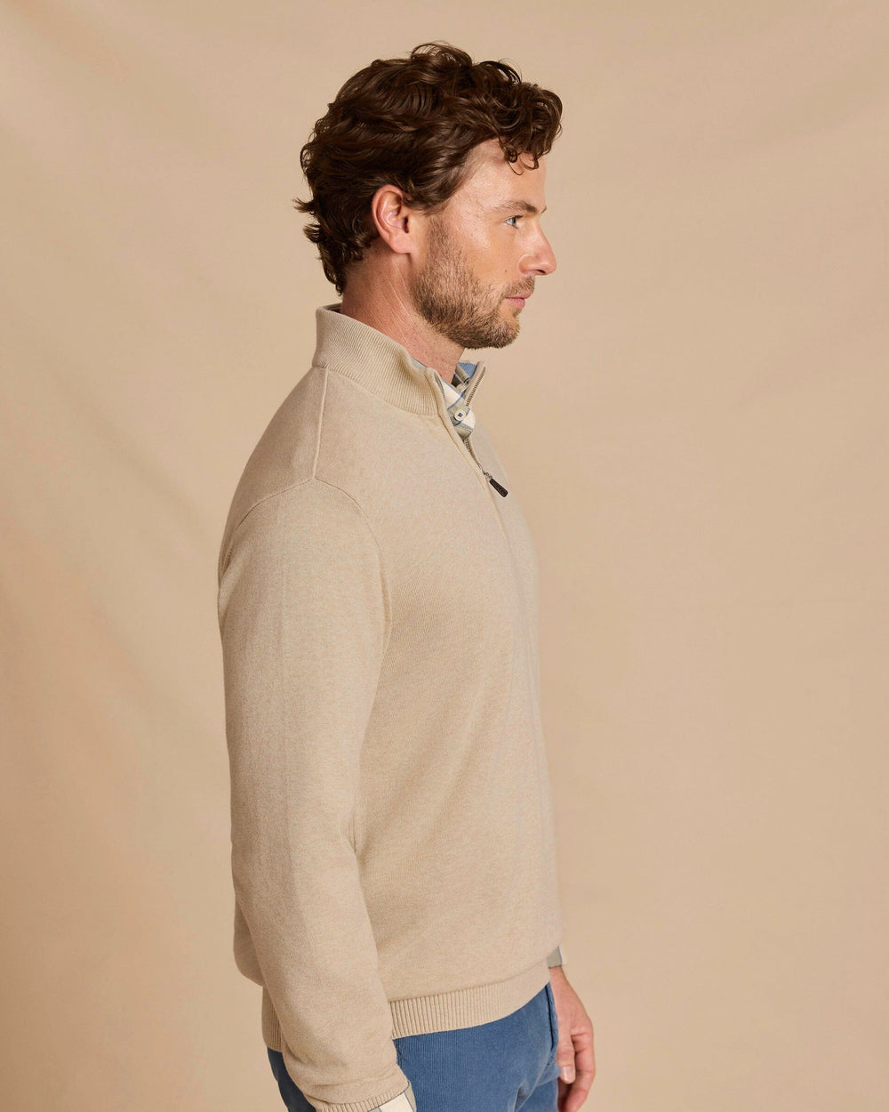 The side view of the Southern Tide Whitehaven Heather Quarter Zip Sweater by Southern Tide - Heather Sand Dunes
